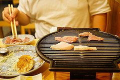 もつ焼よし田 門前仲町店 もつを焼いているところ